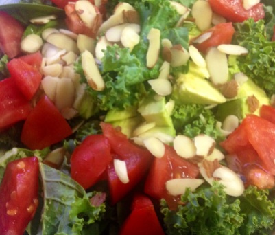 Delicious kale and fresh tomatoes are the base of my lunches and a source of protein is always added.